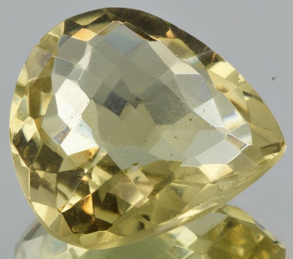 15.44ct Lemon Yellow Citrine Pear Cut: Excellent heated grade 9 of 10 specimen; estimated Gem Guide wholesale $35, estimated retail $100; Africa origin
