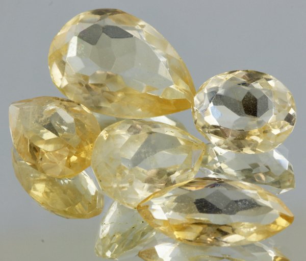 21.35ct Lemon Yellow Citrine Mixed Cut Parcel: Excellent heated grade 9 of 10 specimen; estimated Gem Guide wholesale $35, estimated retail $100; Africa origin