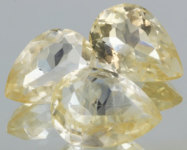 24.4ct Lemon Yellow Citrine Pear Cut Parcel: Excellent heated grade 9 of 10 specimen; estimated Gem Guide wholesale $35, estimated retail $100; Africa origin