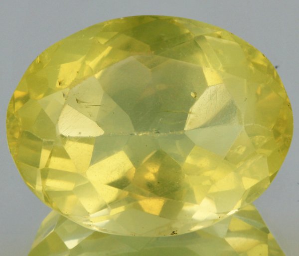 23ct Lemon Yellow Citrine Oval Cut: Excellent heated grade 9 of 10 specimen; estimated Gem Guide wholesale $35, estimated retail $100; Africa origin