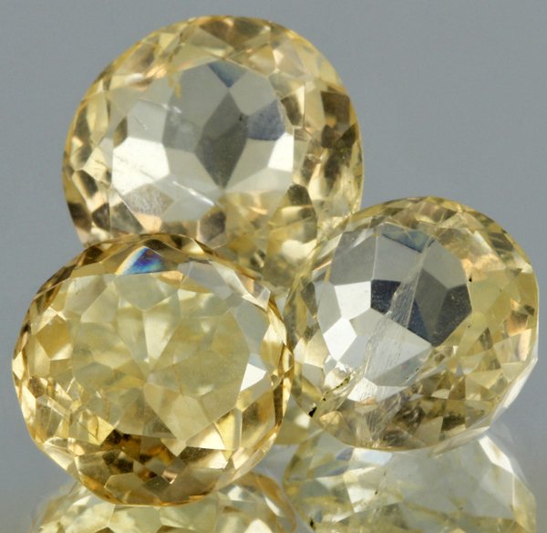 17.1ct Lemon Yellow Citrine Round Cut Parcel: Excellent heated grade 9 of 10 specimen; estimated Gem Guide wholesale $35, estimated retail $100; Africa origin