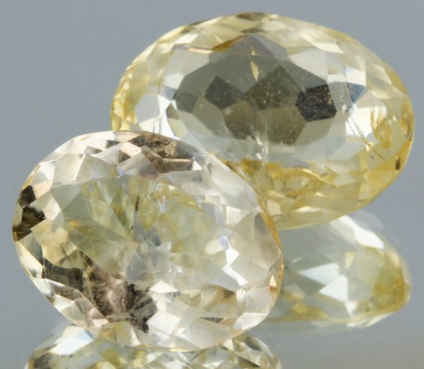 24.4ct Lemon Yellow Citrine Oval Cut Pair: Excellent heated grade 9 of 10 specimen; estimated Gem Guide wholesale $35, estimated retail $100; Africa origin