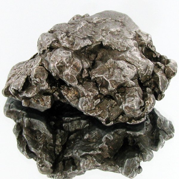 57gm Meteorite Campo Del Cielo Argentina: Scarce remnant of prehistoric (2000-4000bc) meteorite discovered in the 16th century; a main mass of 18 tons has been discovered along with a shower of smaller breakup fragments; cosmic age is young f