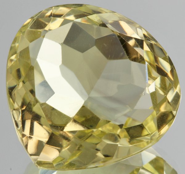 44.6ct Lemon Yellow Citrine Pear Cut: Excellent heated grade 9 of 10 specimen; estimated Gem Guide wholesale $35, estimated retail $100; Brazil origin