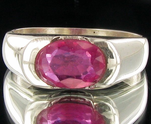 23.1twc Madagascar Ruby Sterling Ring: Well crafted piece; stone with customary treatment