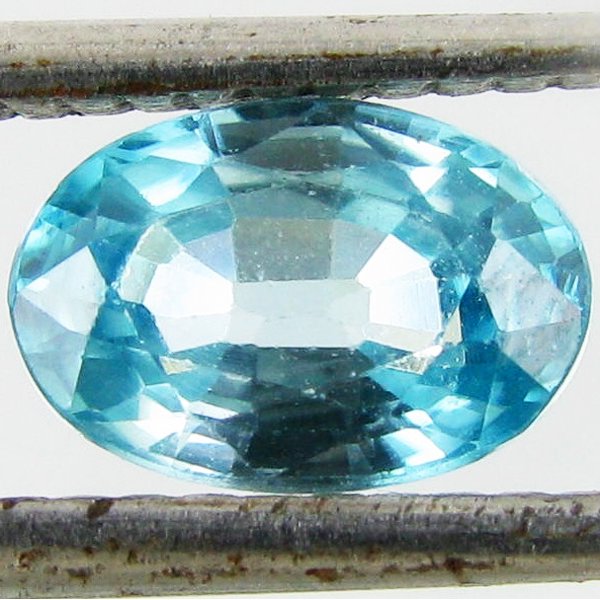 1.29ct Greenish Blue Zircon Oval: Excellent heated grade 9 of 10 specimen; estimated Gem Guide wholesale $129, estimated retail $387; Cambodia origin