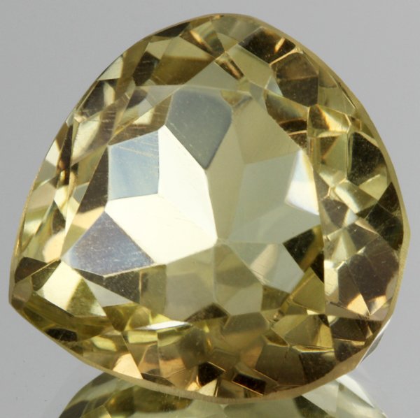 28.75ct Lemon Yellow Citrine Pear Cut: Excellent heated grade 9 of 10 specimen; estimated Gem Guide wholesale $35, estimated retail $100; Brazil origin