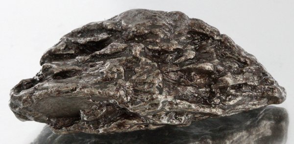 45gm Meteorite Campo Del Cielo Argentina: Scarce remnant of prehistoric (2000-4000bc) meteorite discovered in the 16th century; a main mass of 18 tons has been discovered along with a shower of smaller breakup fragments; cosmic age is young f