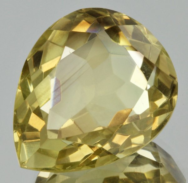 38.35ct Lemon Yellow Citrine Pear Cut: Excellent heated grade 9 of 10 specimen; estimated Gem Guide wholesale $35, estimated retail $100; Brazil origin