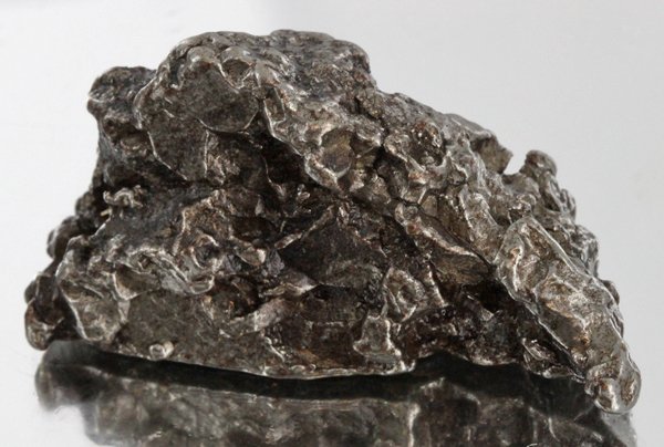 61gm Meteorite Campo Del Cielo Argentina: Scarce remnant of prehistoric (2000-4000bc) meteorite discovered in the 16th century; a main mass of 18 tons has been discovered along with a shower of smaller breakup fragments; cosmic age is young f