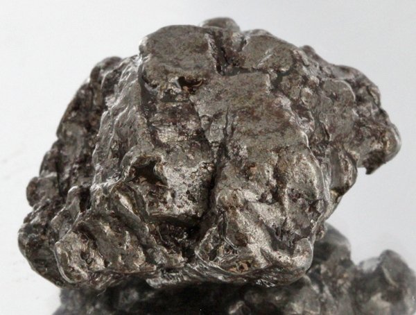 38gm Meteorite Campo Del Cielo Argentina: Scarce remnant of prehistoric (2000-4000bc) meteorite discovered in the 16th century; a main mass of 18 tons has been discovered along with a shower of smaller breakup fragments; cosmic age is young f