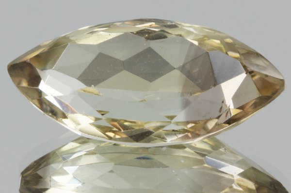 18.25ct Lemon Yellow Citrine Marquise Cut: Excellent heated grade 9 of 10 specimen; estimated Gem Guide wholesale $35, estimated retail $100; Brazil origin