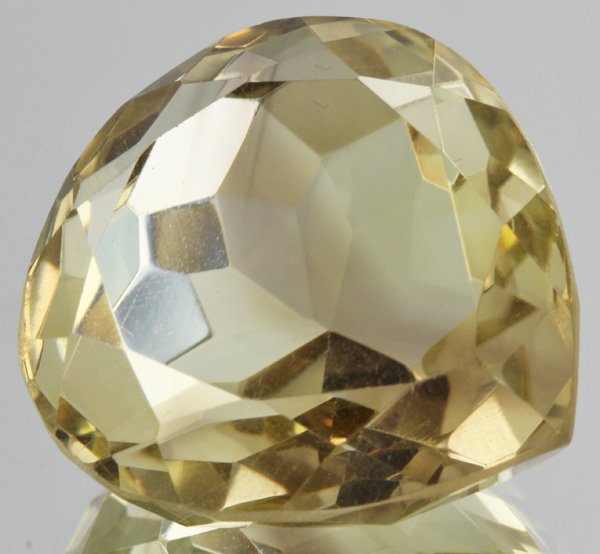 38.1ct Lemon Yellow Citrine Pear Cut: Excellent heated grade 9 of 10 specimen; estimated Gem Guide wholesale $35, estimated retail $100; Brazil origin