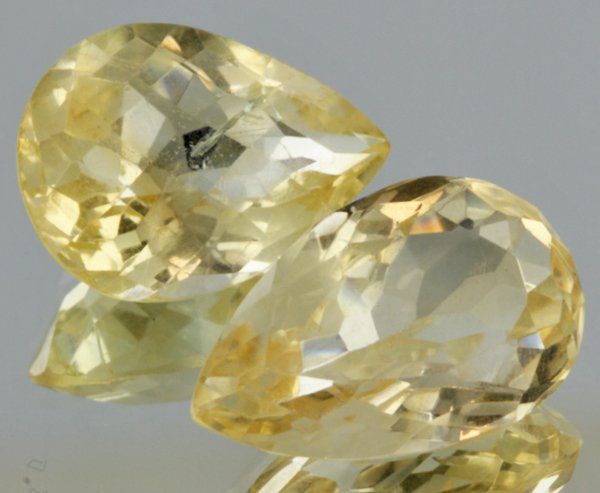 20ct Lemon Yellow Citrine Pear Cut Pair: Excellent heated grade 9 of 10 specimen; estimated Gem Guide wholesale $35, estimated retail $100; Africa origin