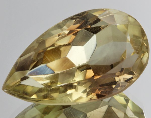 34ct Lemon Yellow Citrine Pear Cut: Excellent heated grade 9 of 10 specimen; estimated Gem Guide wholesale $35, estimated retail $100; Brazil origin