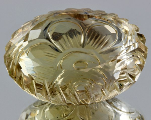 85.9ct Lemon Yellow Citrine Carved Cut: Excellent heated grade 9 of 10 specimen; estimated Gem Guide wholesale $35, estimated retail $100; Brazil origin