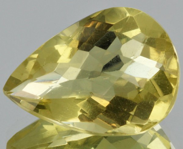 10.66ct Lemon Yellow Citrine Pear Cut: Excellent heated grade 9 of 10 specimen; estimated Gem Guide wholesale $35, estimated retail $100; Africa origin