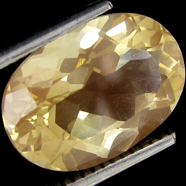 6.40ct Red Yellow Andesine Labradorite: Excellent piece; well cut and colored; with treatment