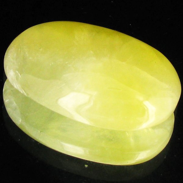 49.05ct Lemon Prehnite Cabochon: Excellent piece; well cut and colored; with treatment
