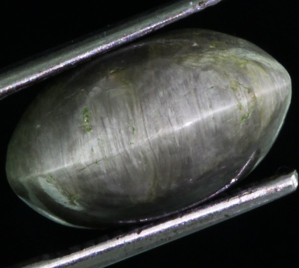 7.37ct Green Chrysoberyl Cats-Eye Cabochon Cut: Excellent heated grade 5 of 10 specimen; estimated Gem Guide wholesale $800, estimated retail $2400; India origin