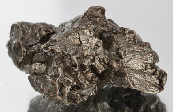 30gm Meteorite Campo Del Cielo Argentina: Scarce remnant of prehistoric (2000-4000bc) meteorite discovered in the 16th century; a main mass of 18 tons has been discovered along with a shower of smaller breakup fragments; cosmic age is young f