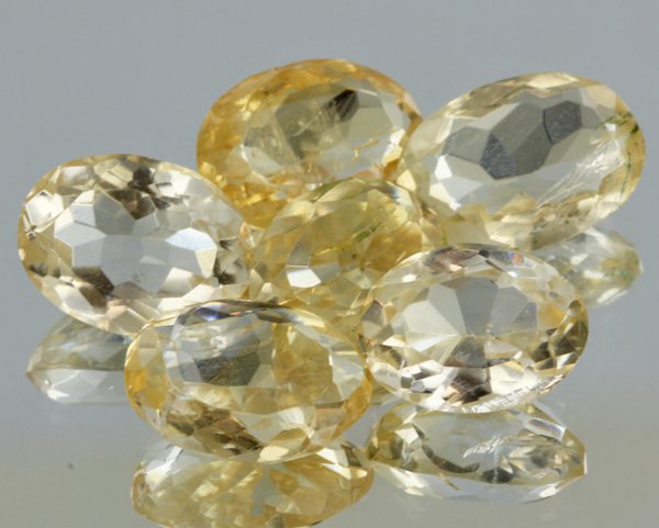 20.05ct Lemon Yellow Citrine Oval Cut Parcel: Excellent heated grade 9 of 10 specimen; estimated Gem Guide wholesale $35, estimated retail $100; Africa origin