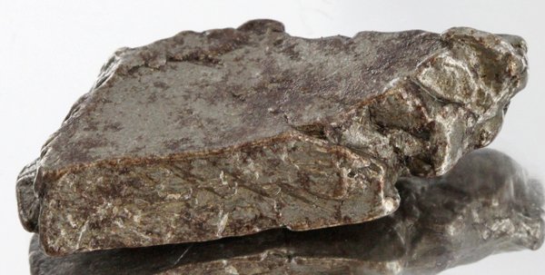 36gm Meteorite Campo Del Cielo Argentina: Scarce remnant of prehistoric (2000-4000bc) meteorite discovered in the 16th century; a main mass of 18 tons has been discovered along with a shower of smaller breakup fragments; cosmic age is young f