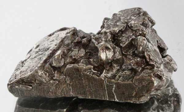 31gm Meteorite Campo Del Cielo Argentina: Scarce remnant of prehistoric (2000-4000bc) meteorite discovered in the 16th century; a main mass of 18 tons has been discovered along with a shower of smaller breakup fragments; cosmic age is young f