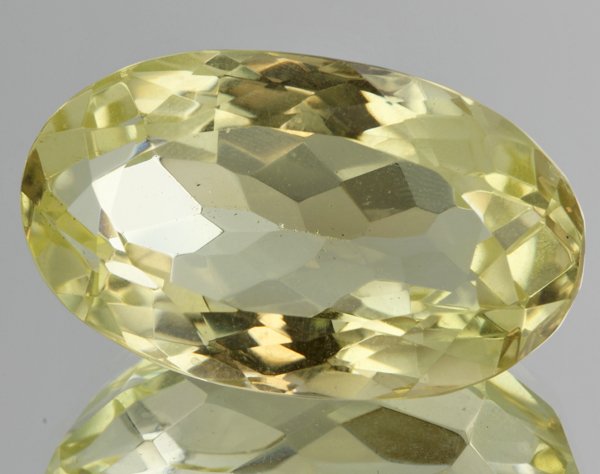 53.05ct Lemon Yellow Citrine Oval Cut: Excellent heated grade 9 of 10 specimen; estimated Gem Guide wholesale $35, estimated retail $100; Brazil origin