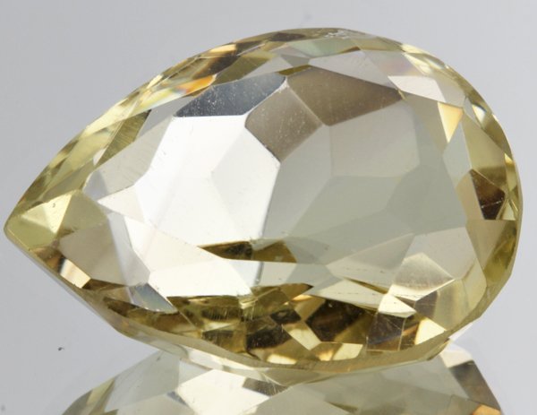 46ct Lemon Yellow Citrine Pear Cut: Excellent heated grade 9 of 10 specimen; estimated Gem Guide wholesale $35, estimated retail $100; Brazil origin