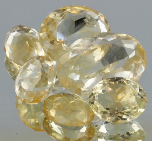 30.4ct Lemon Yellow Citrine Oval Cut Parcel: Excellent heated grade 9 of 10 specimen; estimated Gem Guide wholesale $35, estimated retail $100; Africa origin