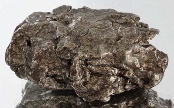 53gm Meteorite Campo Del Cielo Argentina: Scarce remnant of prehistoric (2000-4000bc) meteorite discovered in the 16th century; a main mass of 18 tons has been discovered along with a shower of smaller breakup fragments; cosmic age is young f