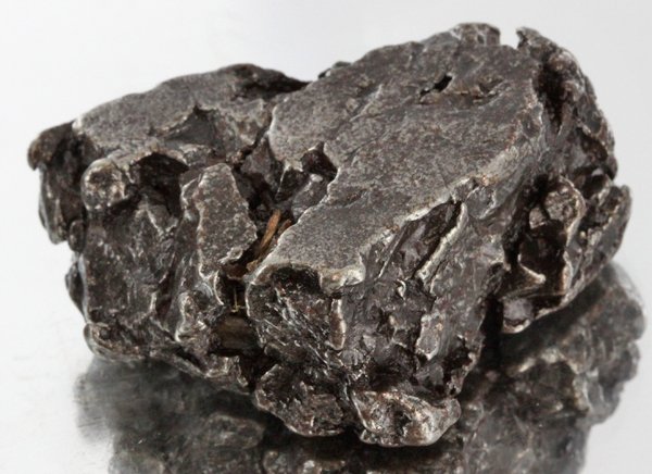 56gm Meteorite Campo Del Cielo Argentina: Scarce remnant of prehistoric (2000-4000bc) meteorite discovered in the 16th century; a main mass of 18 tons has been discovered along with a shower of smaller breakup fragments; cosmic age is young f