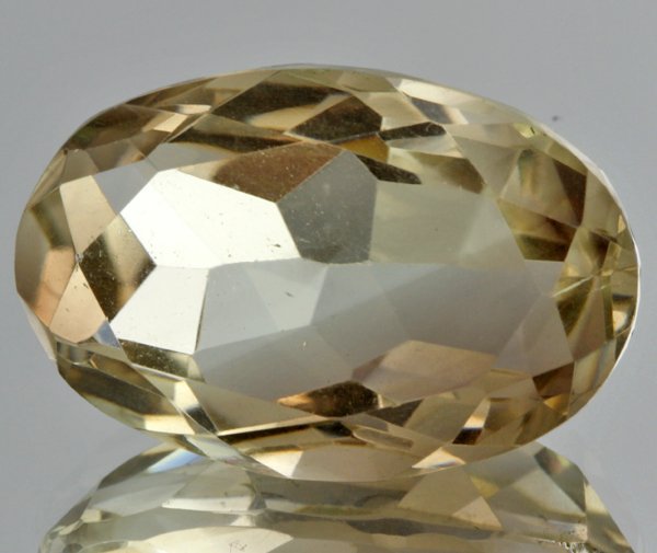 17.9ct Lemon Yellow Citrine Oval Cut: Excellent heated grade 9 of 10 specimen; estimated Gem Guide wholesale $35, estimated retail $100; Brazil origin