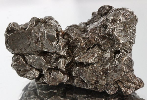 67gm Meteorite Campo Del Cielo Argentina: Scarce remnant of prehistoric (2000-4000bc) meteorite discovered in the 16th century; a main mass of 18 tons has been discovered along with a shower of smaller breakup fragments; cosmic age is young f