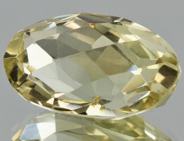 24.85ct Lemon Yellow Citrine Oval Cut: Excellent heated grade 9 of 10 specimen; estimated Gem Guide wholesale $35, estimated retail $100; Brazil origin