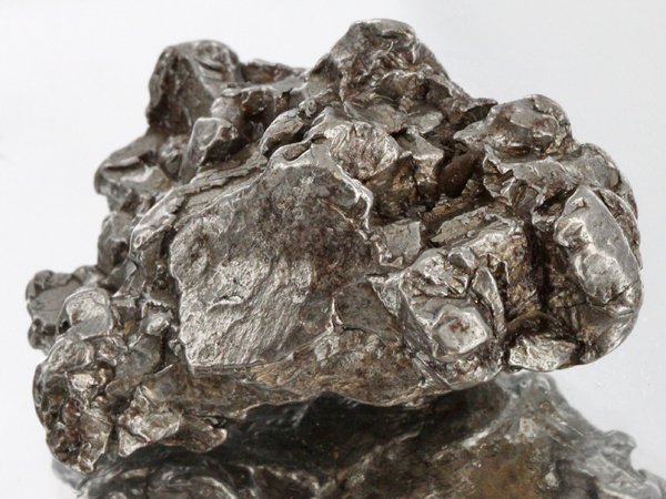 56gm Meteorite Campo Del Cielo Argentina: Scarce remnant of prehistoric (2000-4000bc) meteorite discovered in the 16th century; a main mass of 18 tons has been discovered along with a shower of smaller breakup fragments; cosmic age is young f