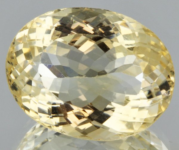 18.09ct Lemon Yellow Citrine Oval Cut: Excellent heated grade 9 of 10 specimen; estimated Gem Guide wholesale $35, estimated retail $100; Africa origin