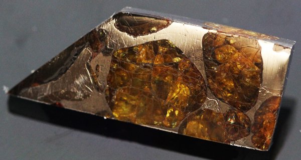 8.65ct Imalac Meteor Pallasite Olivine Space Peridot: Rare jewelry cut piece of nickel iron palasite olivine meteorite; discovered in 1822 in Chile total weight of meteorite was approx. 1000 lbs