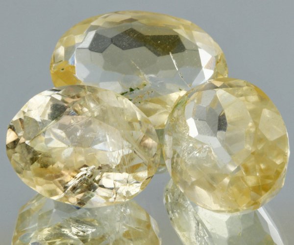 28ct Lemon Yellow Citrine Oval Cut Parcel: Excellent heated grade 9 of 10 specimen; estimated Gem Guide wholesale $35, estimated retail $100; Africa origin