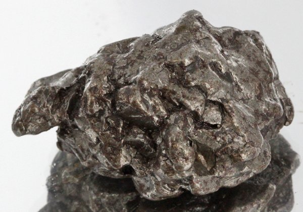 39gm Meteorite Campo Del Cielo Argentina: Scarce remnant of prehistoric (2000-4000bc) meteorite discovered in the 16th century; a main mass of 18 tons has been discovered along with a shower of smaller breakup fragments; cosmic age is young f