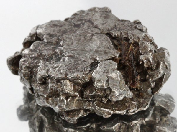 58gm Meteorite Campo Del Cielo Argentina: Scarce remnant of prehistoric (2000-4000bc) meteorite discovered in the 16th century; a main mass of 18 tons has been discovered along with a shower of smaller breakup fragments; cosmic age is young f