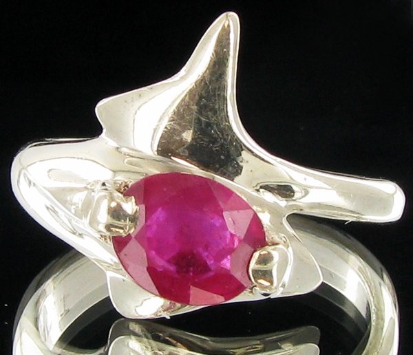 22.2twc Madagascar Ruby Sterling Ring: Well crafted piece; stone with customary treatment