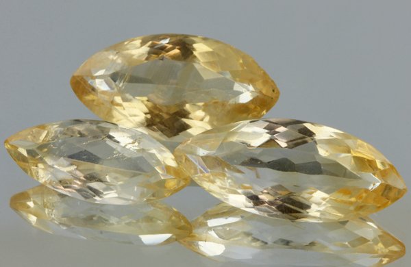 23ct Lemon Yellow Citrine Marquise Cut Parcel: Excellent heated grade 9 of 10 specimen; estimated Gem Guide wholesale $35, estimated retail $100; Africa origin