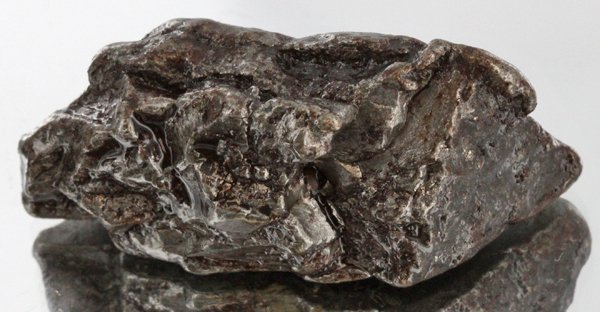 41gm Meteorite Campo Del Cielo Argentina: Scarce remnant of prehistoric (2000-4000bc) meteorite discovered in the 16th century; a main mass of 18 tons has been discovered along with a shower of smaller breakup fragments; cosmic age is young f