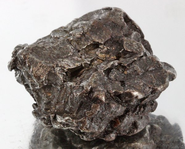 57gm Meteorite Campo Del Cielo Argentina: Scarce remnant of prehistoric (2000-4000bc) meteorite discovered in the 16th century; a main mass of 18 tons has been discovered along with a shower of smaller breakup fragments; cosmic age is young f
