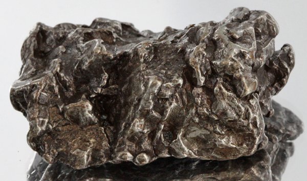 60gm Meteorite Campo Del Cielo Argentina: Scarce remnant of prehistoric (2000-4000bc) meteorite discovered in the 16th century; a main mass of 18 tons has been discovered along with a shower of smaller breakup fragments; cosmic age is young f