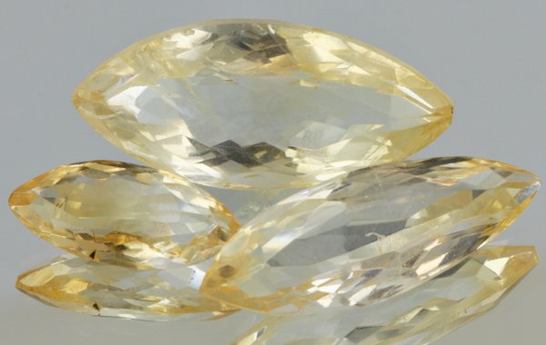 27.45ct Lemon Yellow Citrine Marquise Cut Parcel: Excellent heated grade 9 of 10 specimen; estimated Gem Guide wholesale $35, estimated retail $100; Africa origin