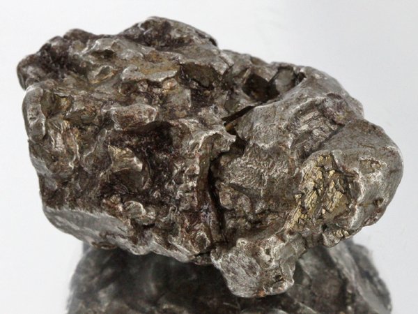 57gm Meteorite Campo Del Cielo Argentina: Scarce remnant of prehistoric (2000-4000bc) meteorite discovered in the 16th century; a main mass of 18 tons has been discovered along with a shower of smaller breakup fragments; cosmic age is young f