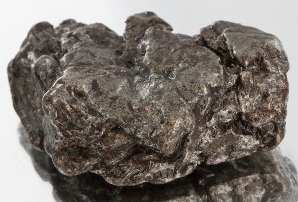 36gm Meteorite Campo Del Cielo Argentina: Scarce remnant of prehistoric (2000-4000bc) meteorite discovered in the 16th century; a main mass of 18 tons has been discovered along with a shower of smaller breakup fragments; cosmic age is young f